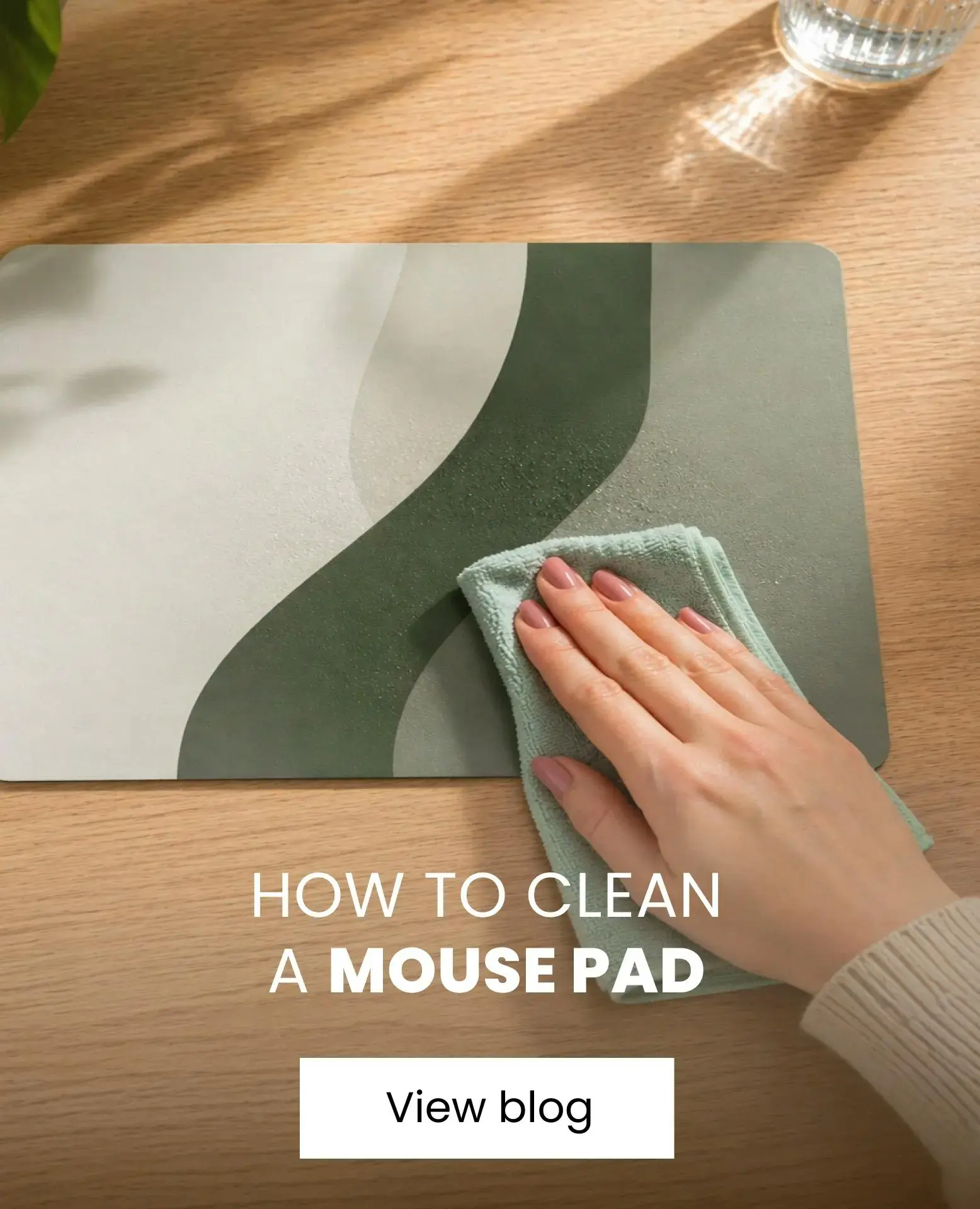 a green mouse pad being cleaned
