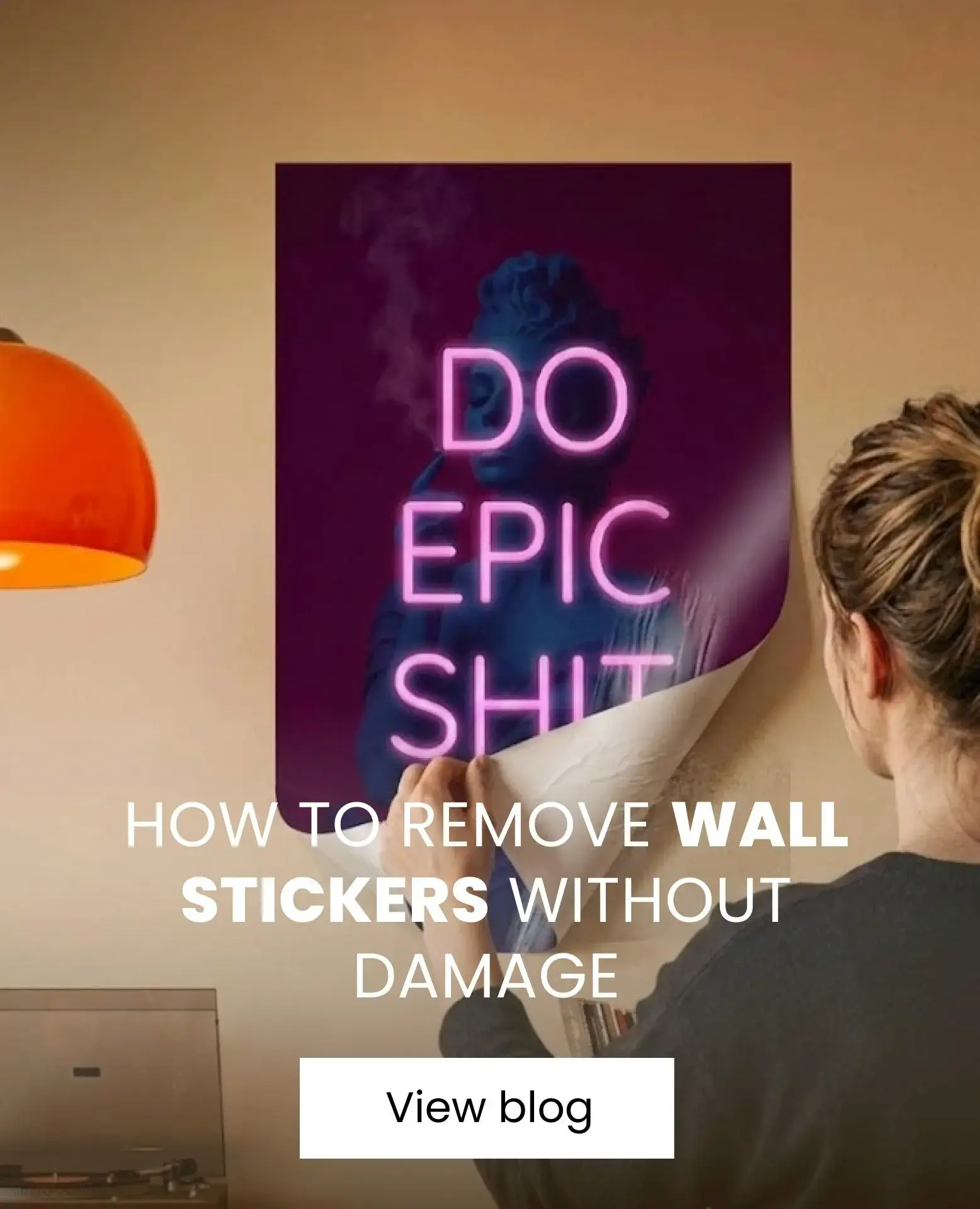 girl removing a wall sticker from her wall