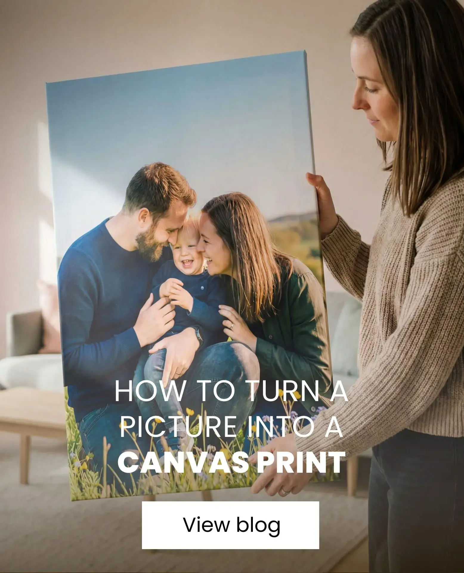 woman holding a personalized canvas in her hands