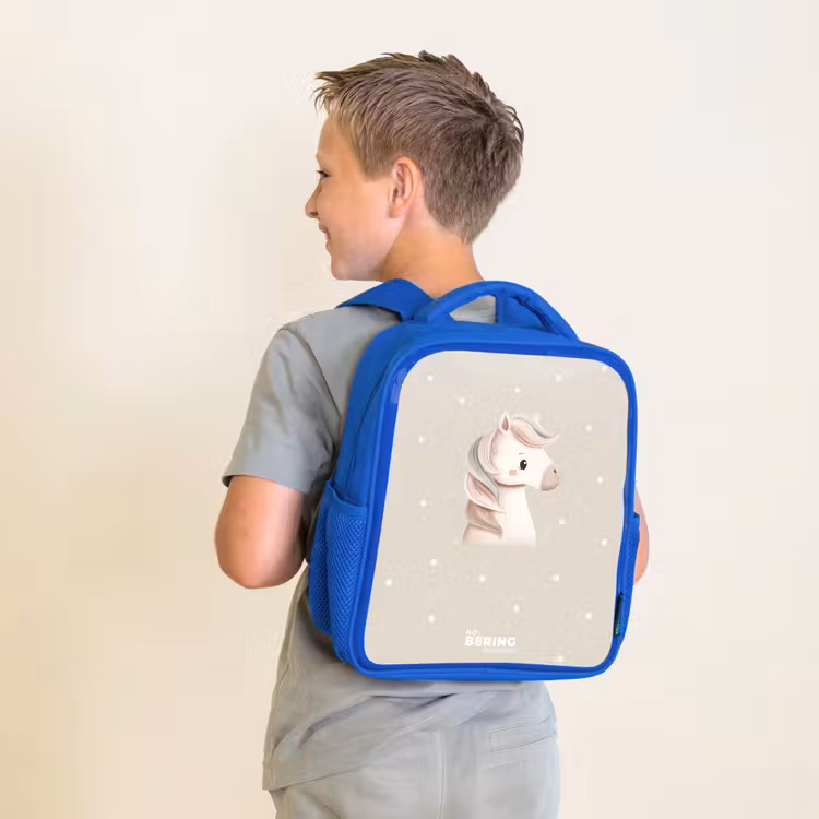 Pony omringd door stippen in beige kleuren Kinderrugzak - Blauw middel -sfeer2