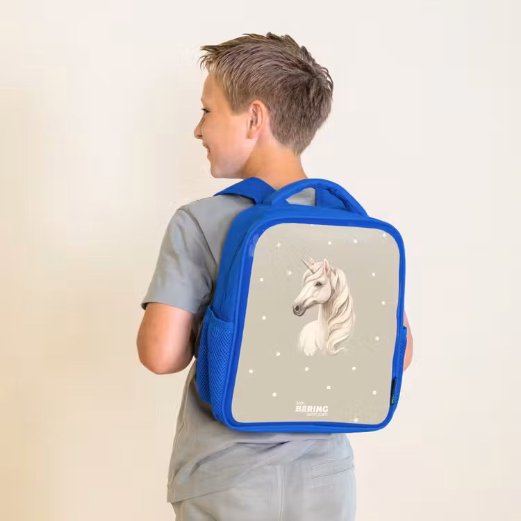 Eenhoorn omringd door stippen in neutrale kleuren Kinderrugzak - Blauw middel -sfeer2