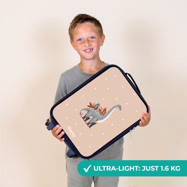 Blauwe dinosaurus op een beige stippenachtergrond Kinderkoffer - Zwart klein -sfeer4_UK