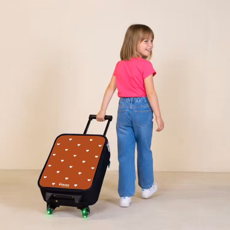 Wit hartjespatroon op oranje bruine achtergrond Kinderkoffer - Zwart klein -sfeer1