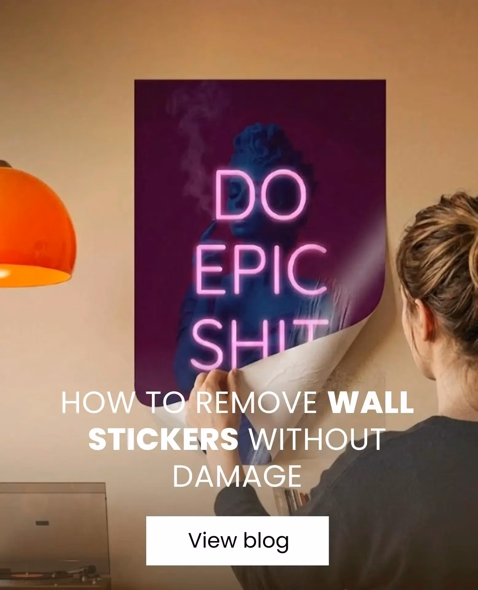 girl removing a wall sticker from her wall